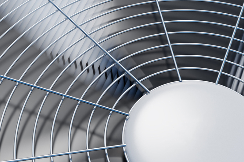 Up close shot of air conditioning unit blades.